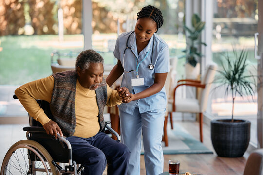 A smiling senior client with a pet, receiving in-home care.