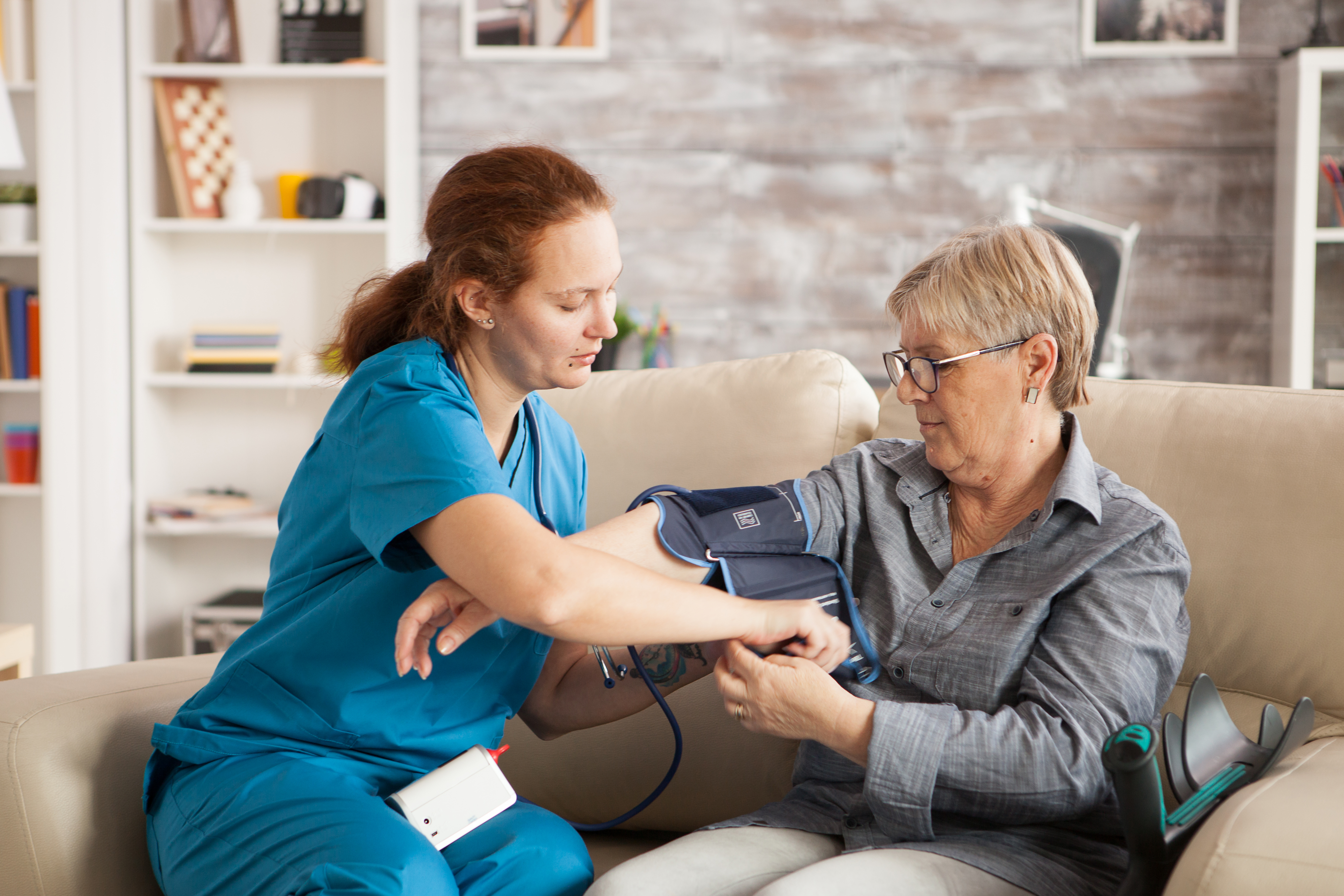 A smiling senior client with a pet, providing a visual for the home care services.